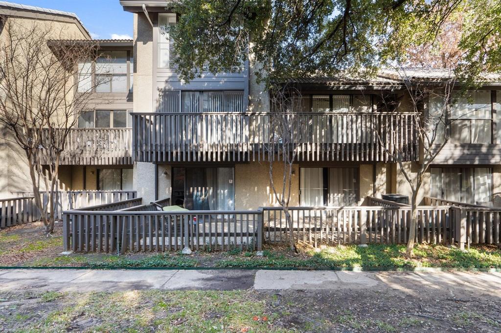 4533 North O'Connor Road, Unit 2208 Irving, TX 75062 - Photo 3 of 28 a front view of a house with a garden