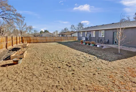an aerial view of a house with a ocean view