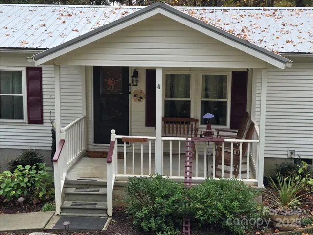 a view of a house with entryway and stairs
