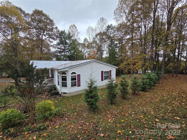 a house with trees in the background