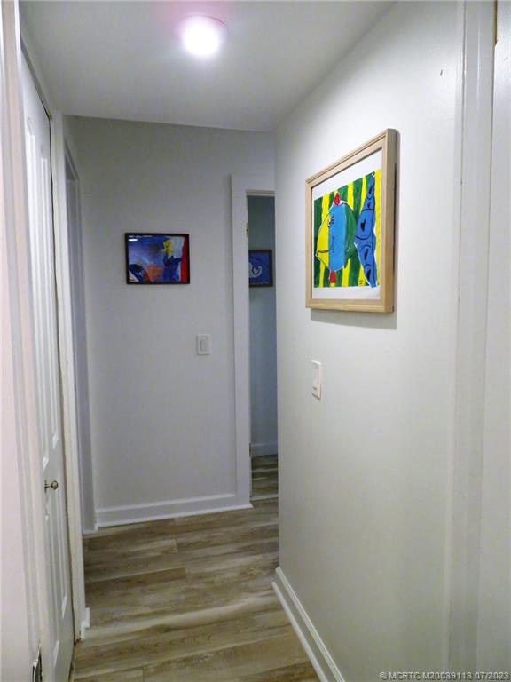 800 Northwest Fork Road, Unit 4 Stuart, FL 34994 - Photo 14 of 31 a view of an entryway with wooden floor
