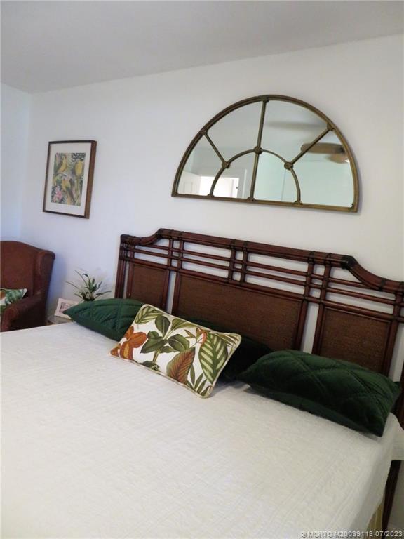 800 Northwest Fork Road, Unit 4 Stuart, FL 34994 - Photo 23 of 31 a view of staircase with a rug