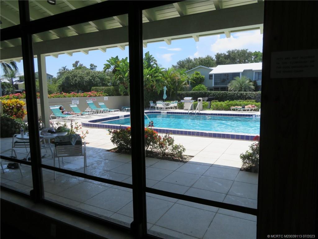 800 Northwest Fork Road, Unit 4 Stuart, FL 34994 - Photo 25 of 31 a view of a patio with lake view