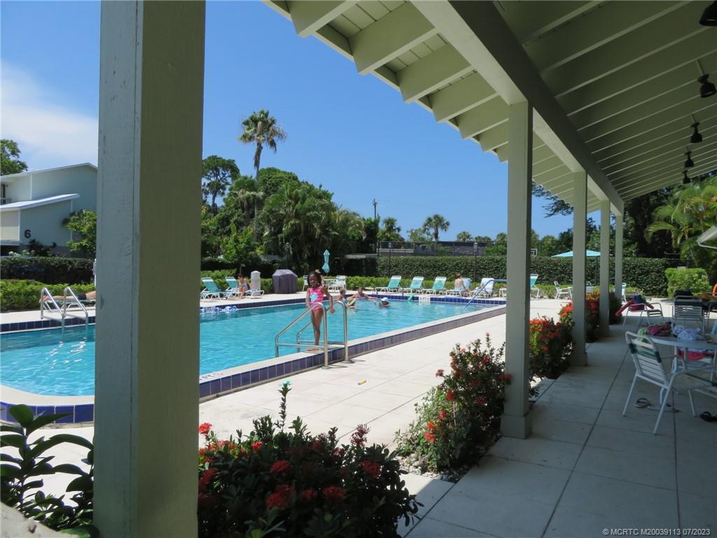 800 Northwest Fork Road, Unit 4 Stuart, FL 34994 - Photo 27 of 31 a view of swimming pool from a balcony