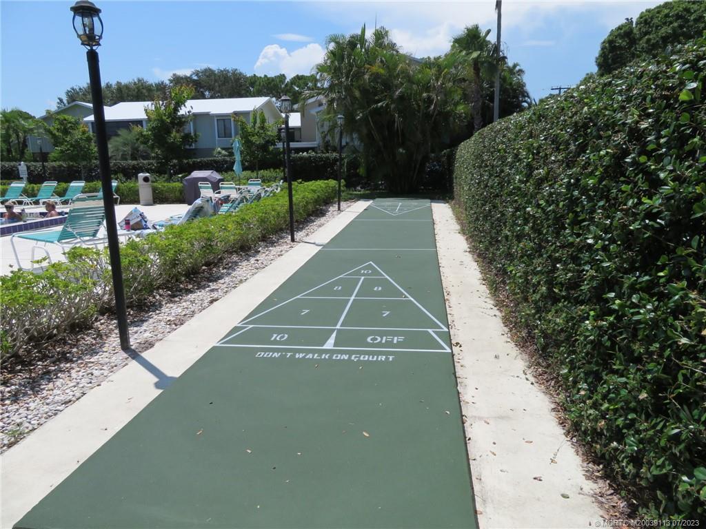 800 Northwest Fork Road, Unit 4 Stuart, FL 34994 - Photo 29 of 31 a view of a back yard of the house