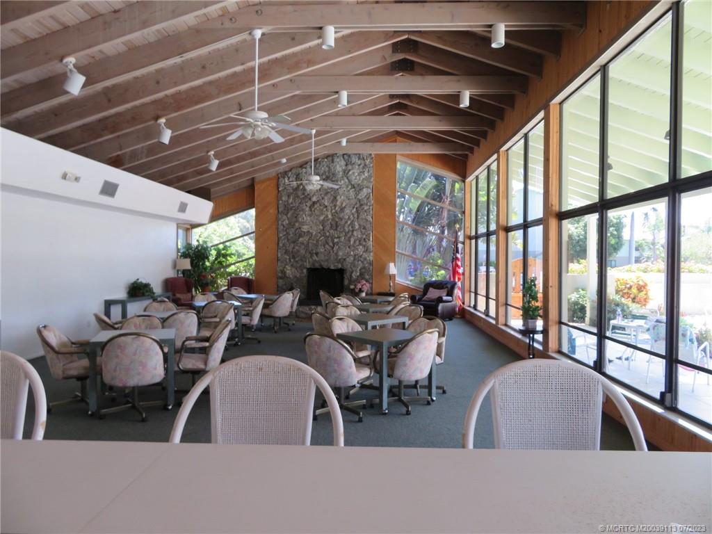 800 Northwest Fork Road, Unit 4 Stuart, FL 34994 - Photo 30 of 31 a view of a dining room with furniture window and outside view