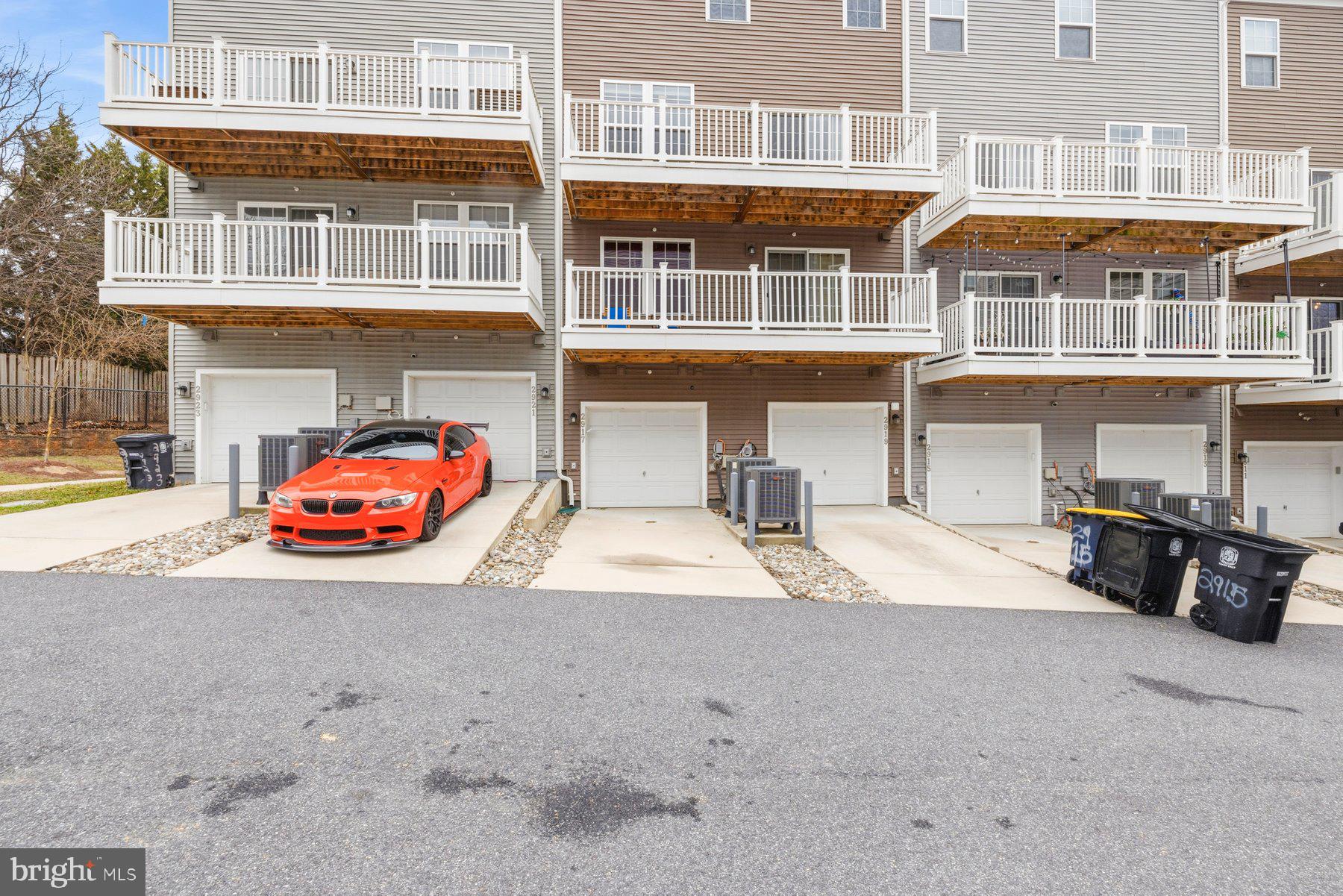 2917 Duvall Ridge Road, Unit 559 Hyattsville, MD 20785 - Photo 29 of 31 a car parked in front of a building