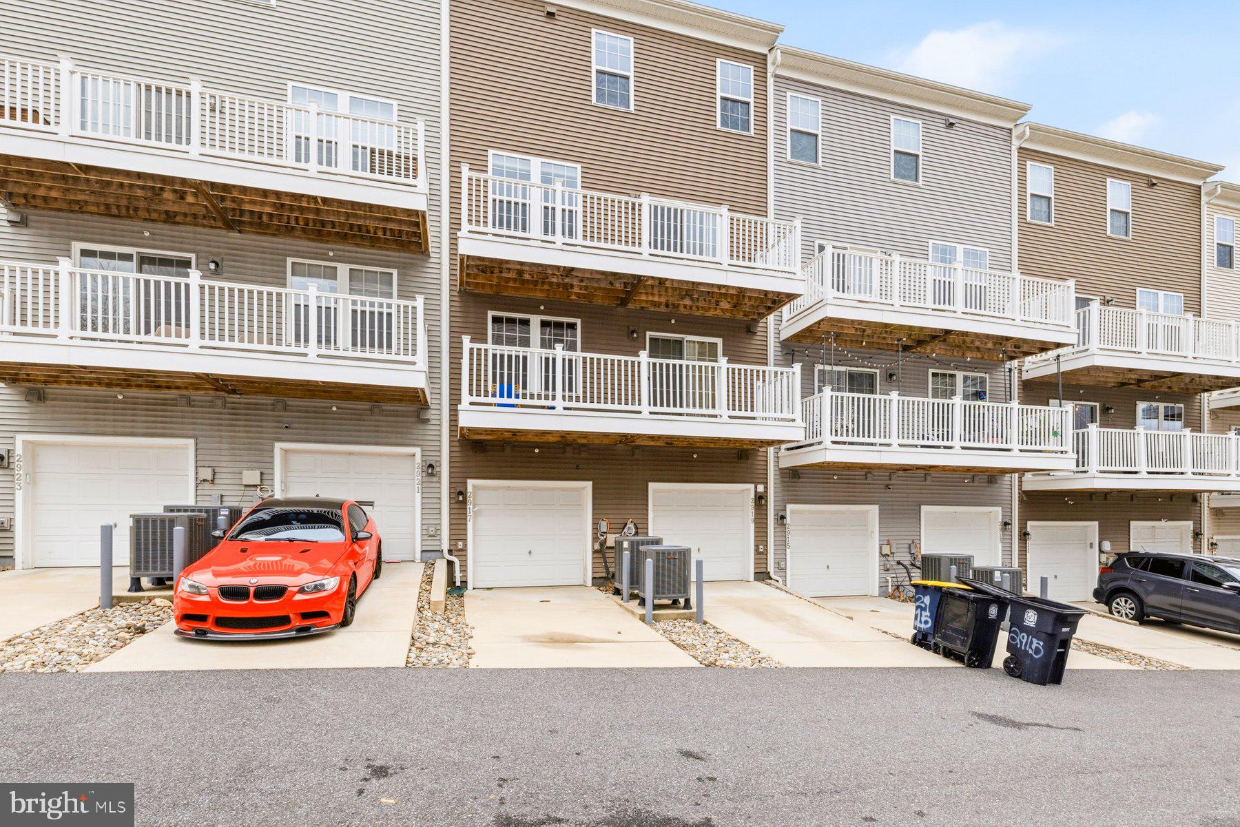 2917 Duvall Ridge Road, Unit 559 Hyattsville, MD 20785 - Photo 30 of 31 a car parked in front of a building