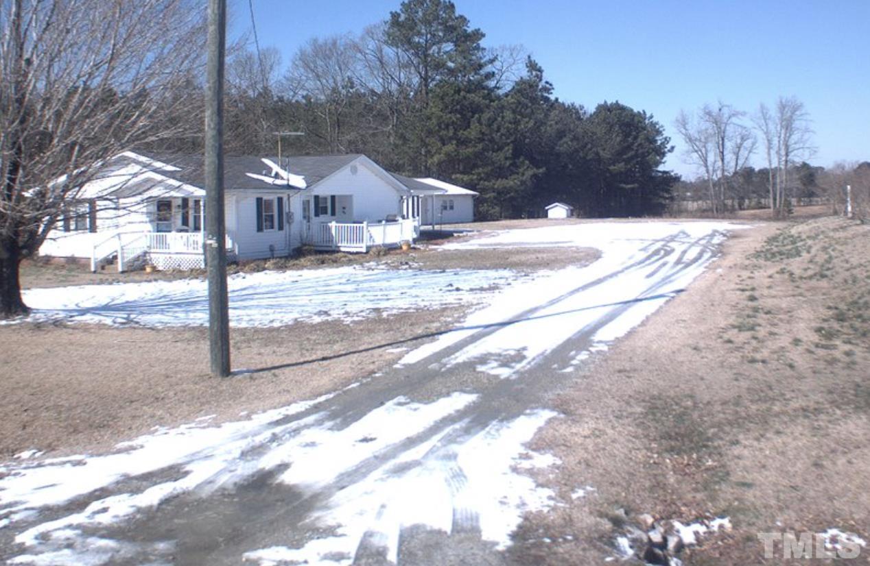 2929 Wall Store Road, Unit 0WALL STORE ROAD Garner, NC 27529 - Photo 8 of 16 a view of a house with a yard covered in snow