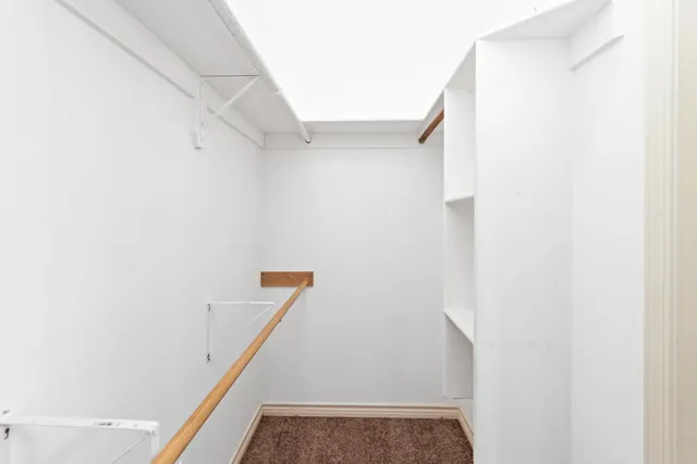 a view of hallway with stairs