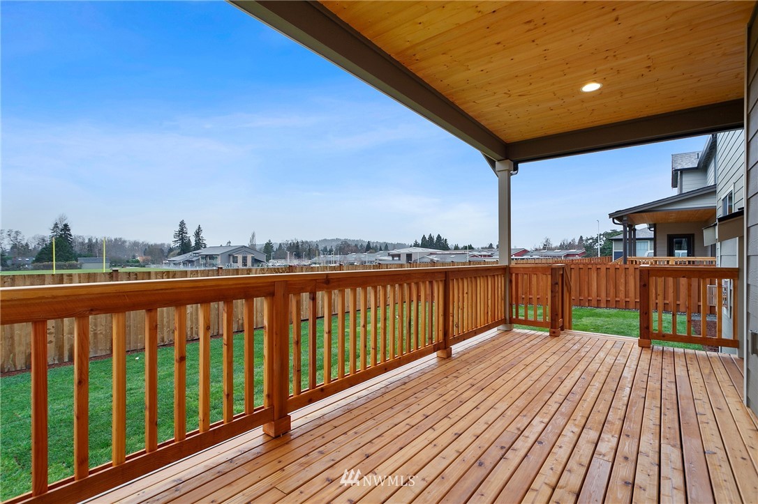 1630 Gault Street, Unit 6 Sumner, WA 98390 - Photo 22 of 24 a view of balcony with wooden floor