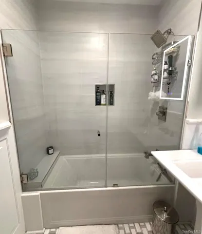 a bathroom with a bathtub