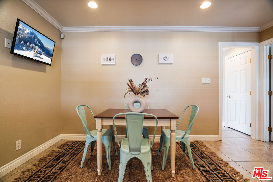 1043 Appleton Road Simi Valley, CA 93065 - Photo 12 of 53 a view of a dining room with furniture and wooden floor