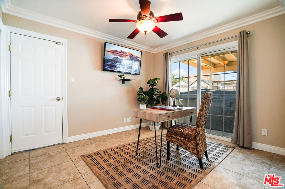 1043 Appleton Road Simi Valley, CA 93065 - Photo 15 of 53 a workspace with wooden floor and a window