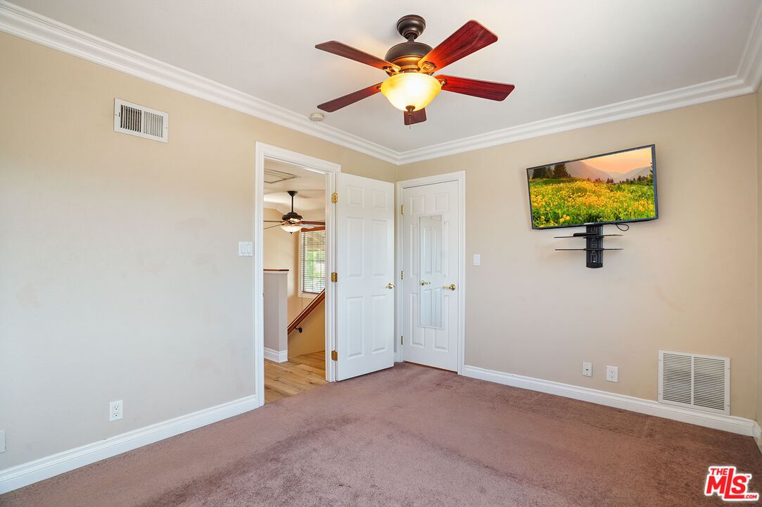 1043 Appleton Road Simi Valley, CA 93065 - Photo 20 of 53 a view of room with a ceiling fan