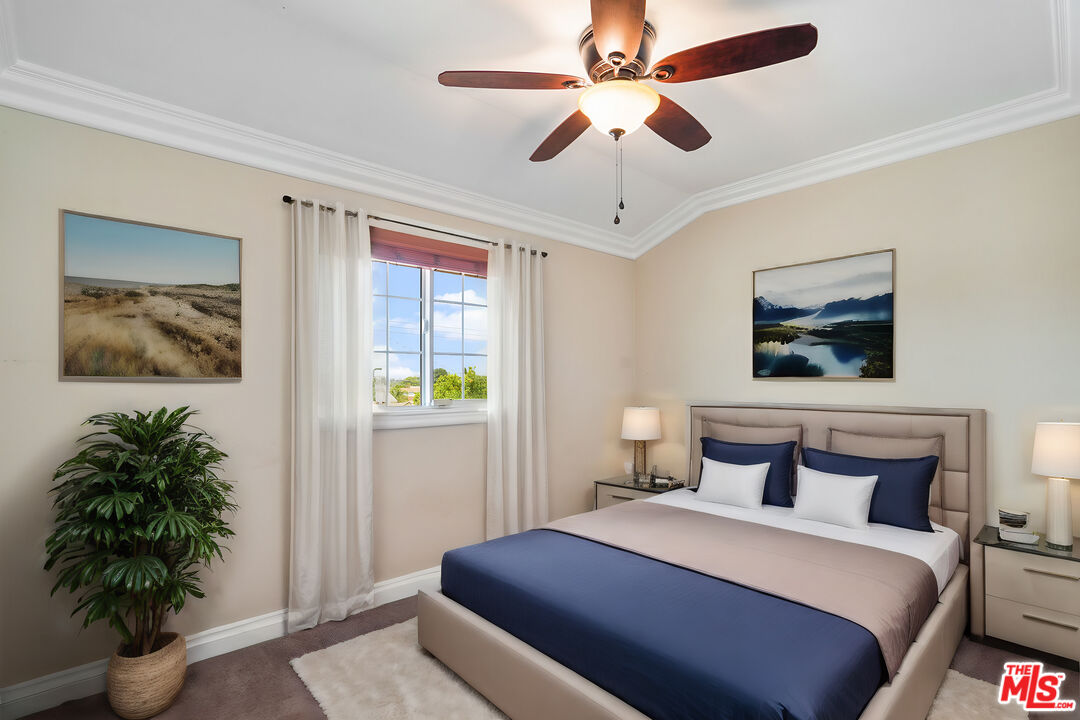 1043 Appleton Road Simi Valley, CA 93065 - Photo 24 of 53 a bedroom with a bed and a potted plant
