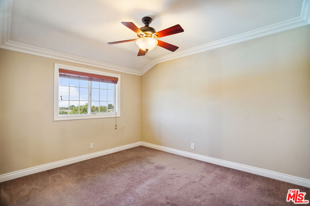 1043 Appleton Road Simi Valley, CA 93065 - Photo 25 of 53 an empty room with window and ceiling fan