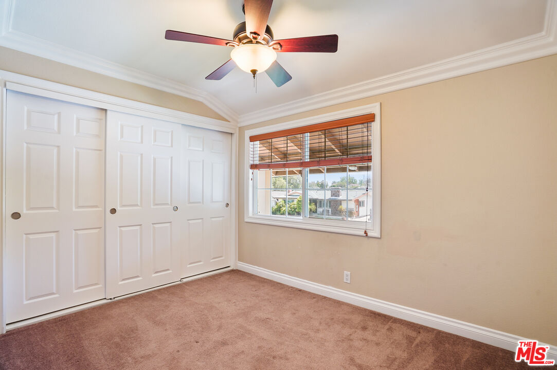 1043 Appleton Road Simi Valley, CA 93065 - Photo 28 of 53 an empty room with windows and fan