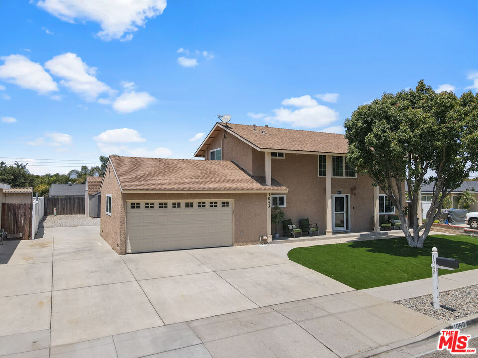 1043 Appleton Road Simi Valley, CA 93065 - Photo 3 of 53 a view of a house with a yard