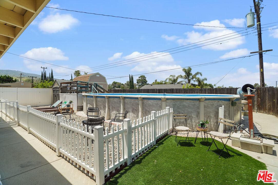1043 Appleton Road Simi Valley, CA 93065 - Photo 36 of 53 a view of a chair and tables front of the house