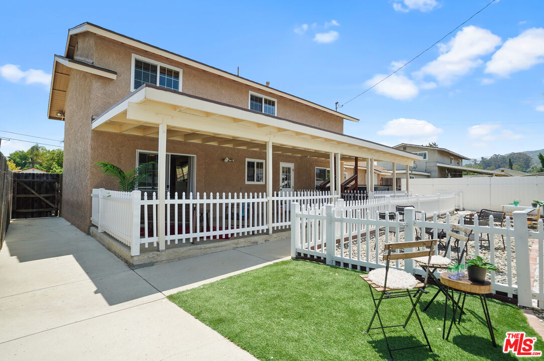 1043 Appleton Road Simi Valley, CA 93065 - Photo 38 of 53 a porch with a bench in front of house