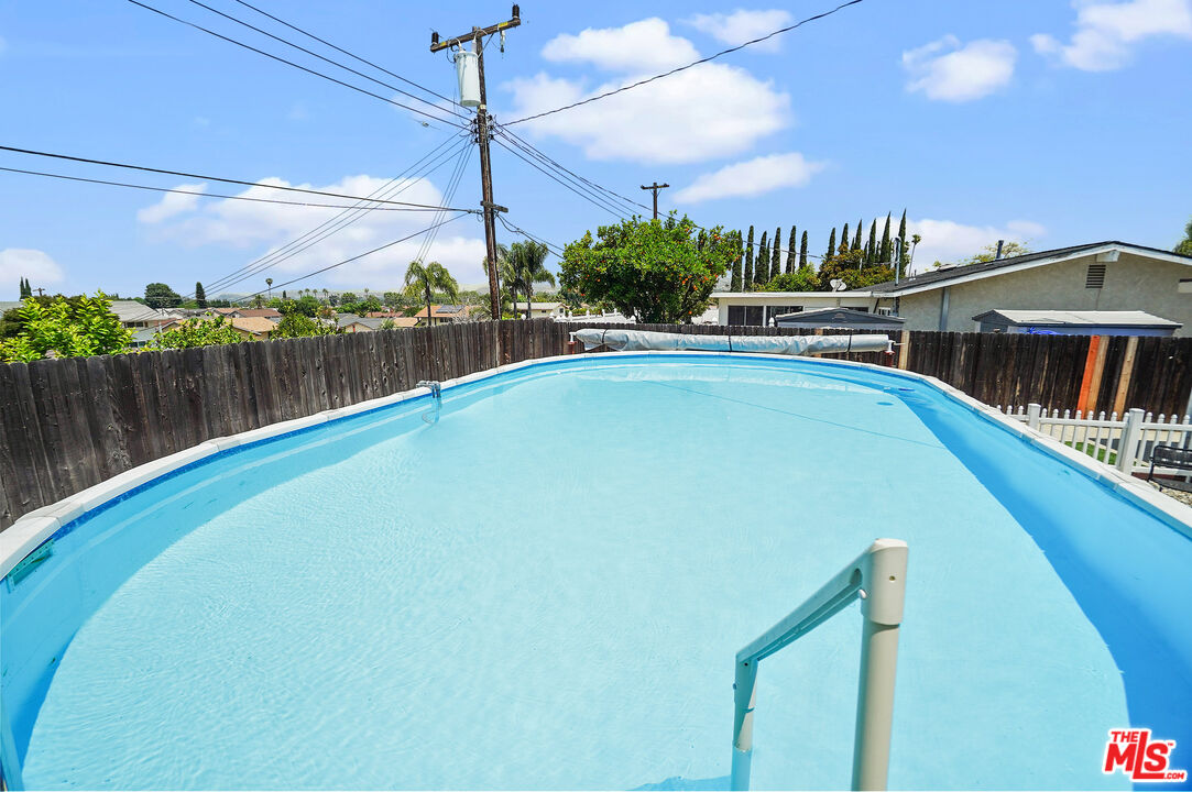 1043 Appleton Road Simi Valley, CA 93065 - Photo 43 of 53 a view of a swimming pool with a lake view