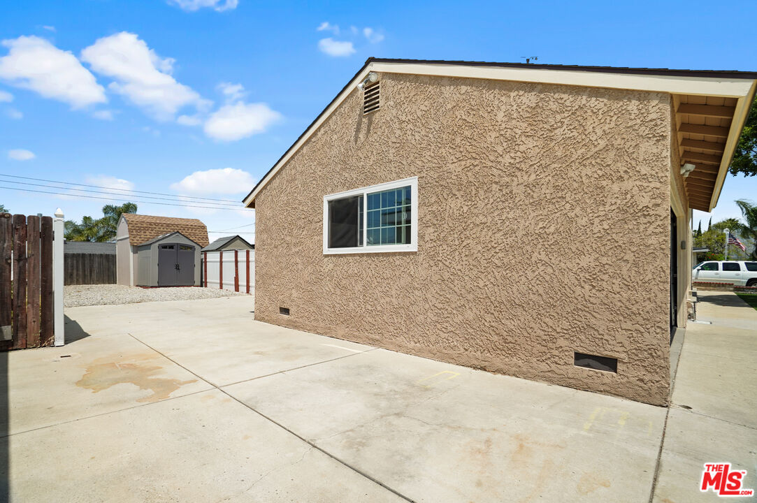 1043 Appleton Road Simi Valley, CA 93065 - Photo 45 of 53 a view of a blue house with a outdoor space