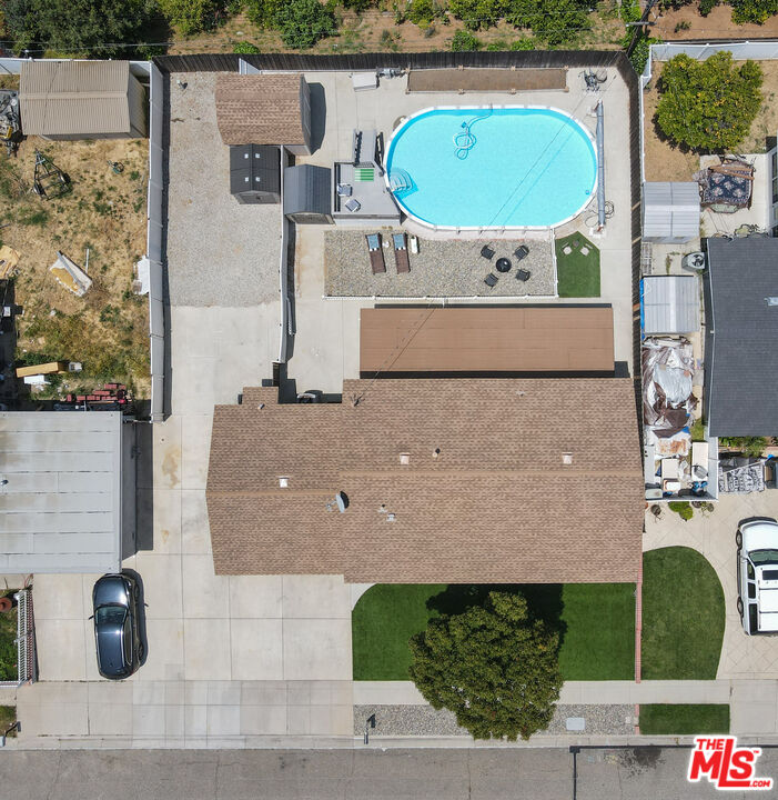 1043 Appleton Road Simi Valley, CA 93065 - Photo 50 of 53 an aerial view of a house with a swimming pool