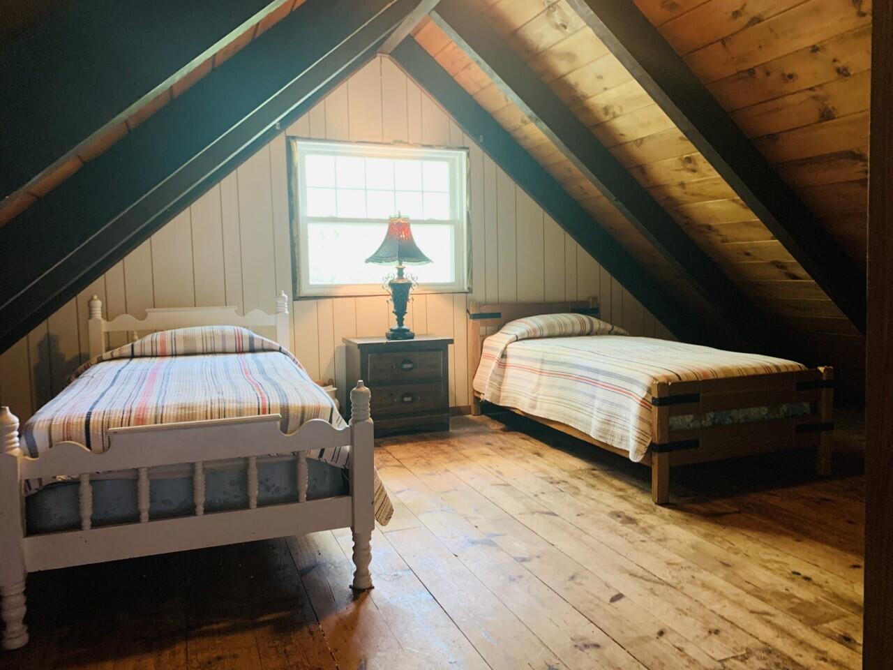 46 Williams Avenue Pocasset, MA 02559 - Photo 12 of 26 a bedroom with a bed and a window