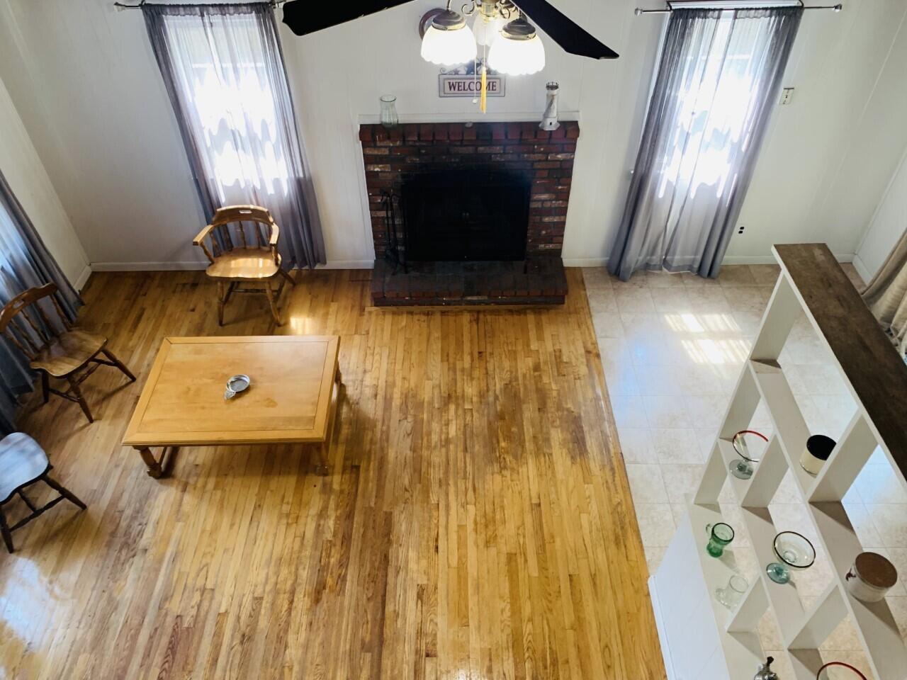 46 Williams Avenue Pocasset, MA 02559 - Photo 16 of 26 a living room with furniture and a fireplace