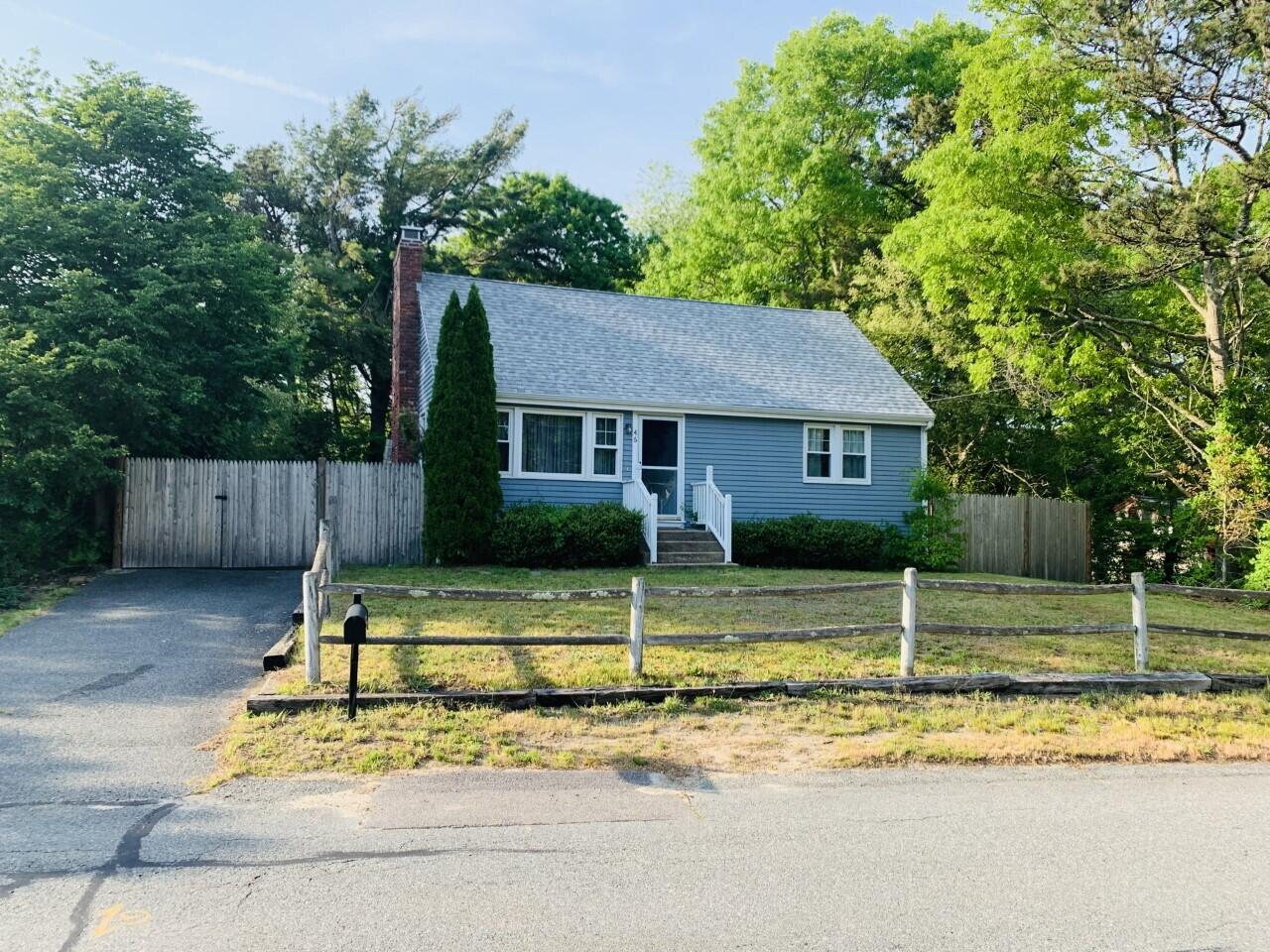 46 Williams Avenue Pocasset, MA 02559 - Photo 24 of 26 a view of house with a backyard
