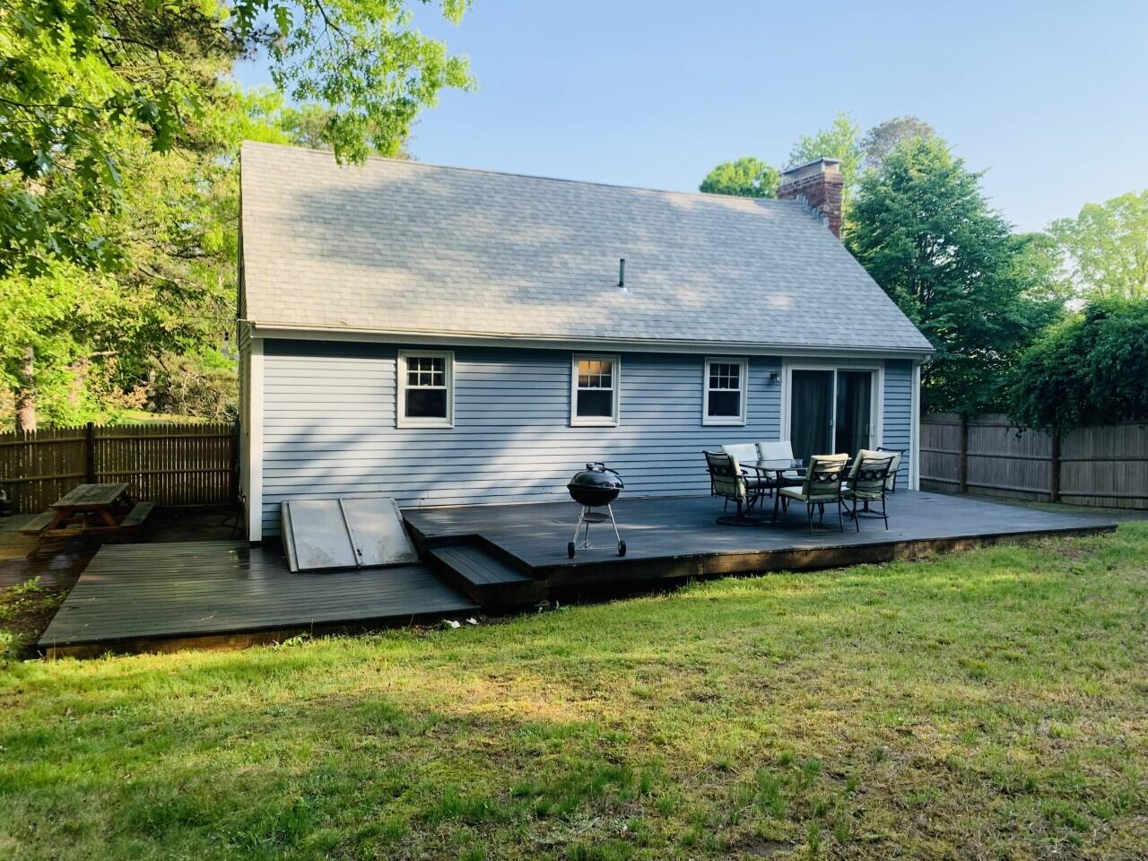 46 Williams Avenue Pocasset, MA 02559 - Photo 25 of 26 a view of a house with backyard and sitting area