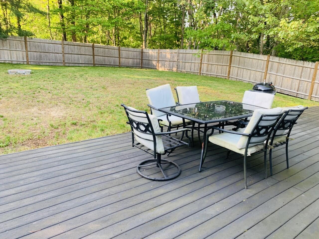46 Williams Avenue Pocasset, MA 02559 - Photo 3 of 26 a view of a chairs and table on the wooden floor