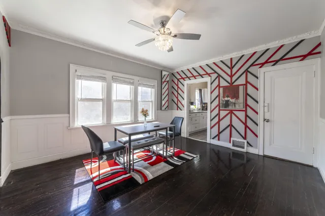 a kitchen with stainless steel appliances granite countertop a stove refrigerator and microwave