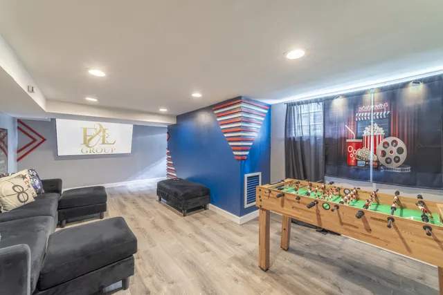 a bedroom with a bed and a couch