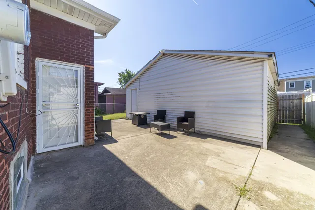 an aerial view of houses with outdoor space