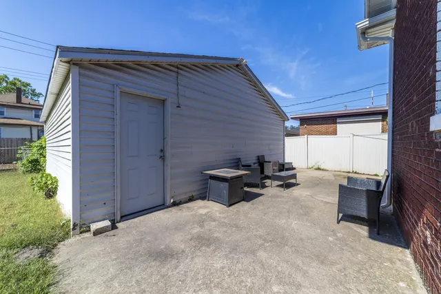 an aerial view of houses with outdoor space