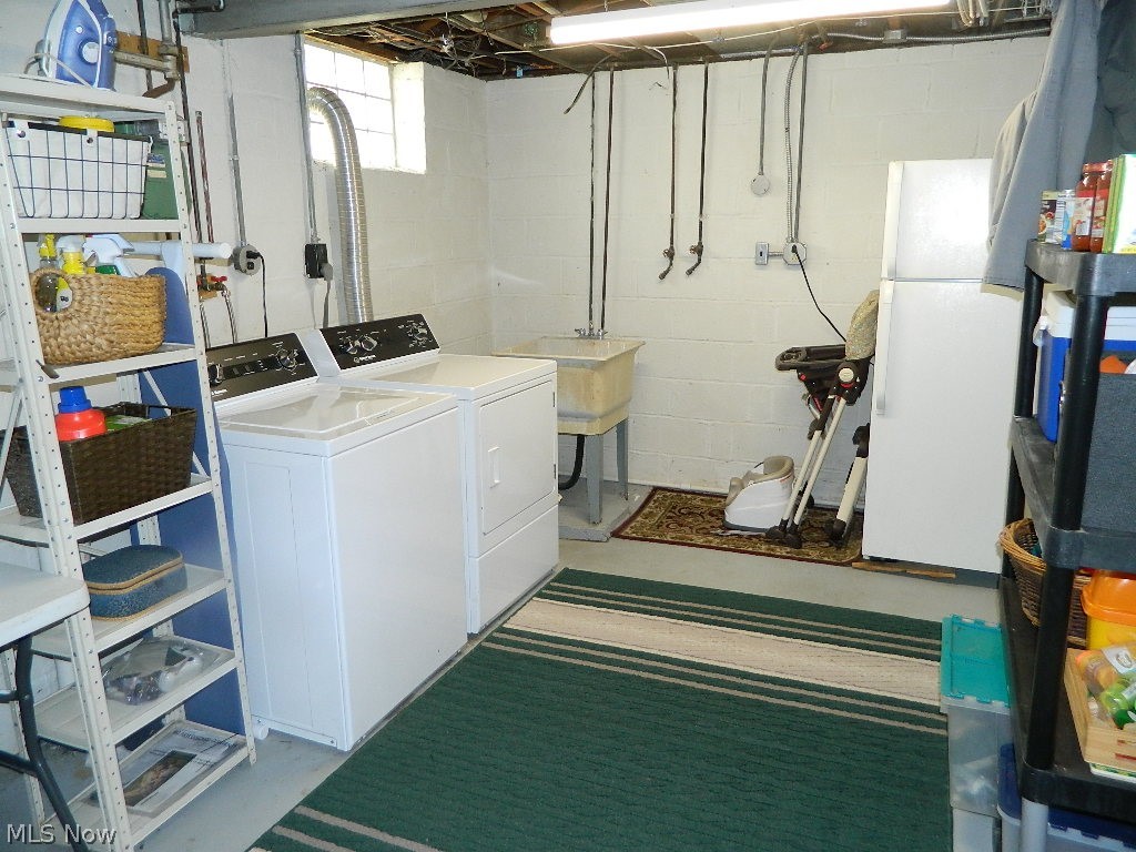 1604 Lyndhurst Road Lyndhurst, OH 44124 - Photo 27 of 35 Laundry/Utility Room - Extra Fridge to Remain; the Freezer Portion of the Fridge is Not Reliable, But Great for Overflow Food and Beverage!