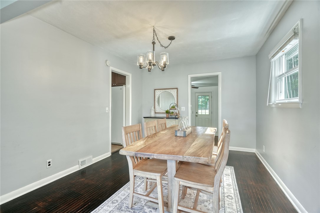 1038 Whalen Road Penfield, NY 14526 - Photo 8 of 46 Formal dining space with hardwood flooring