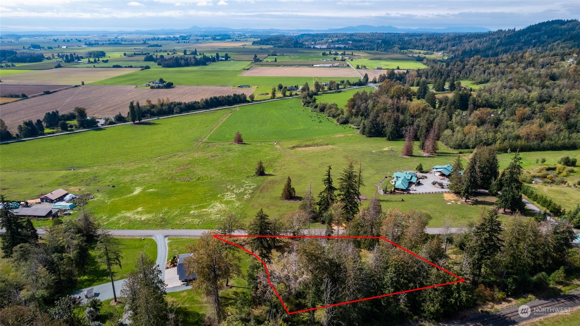0 Union Road Sedro-Woolley, WA 98284 - Photo 2 of 13 an aerial view of a houses with outdoor space and mountain view