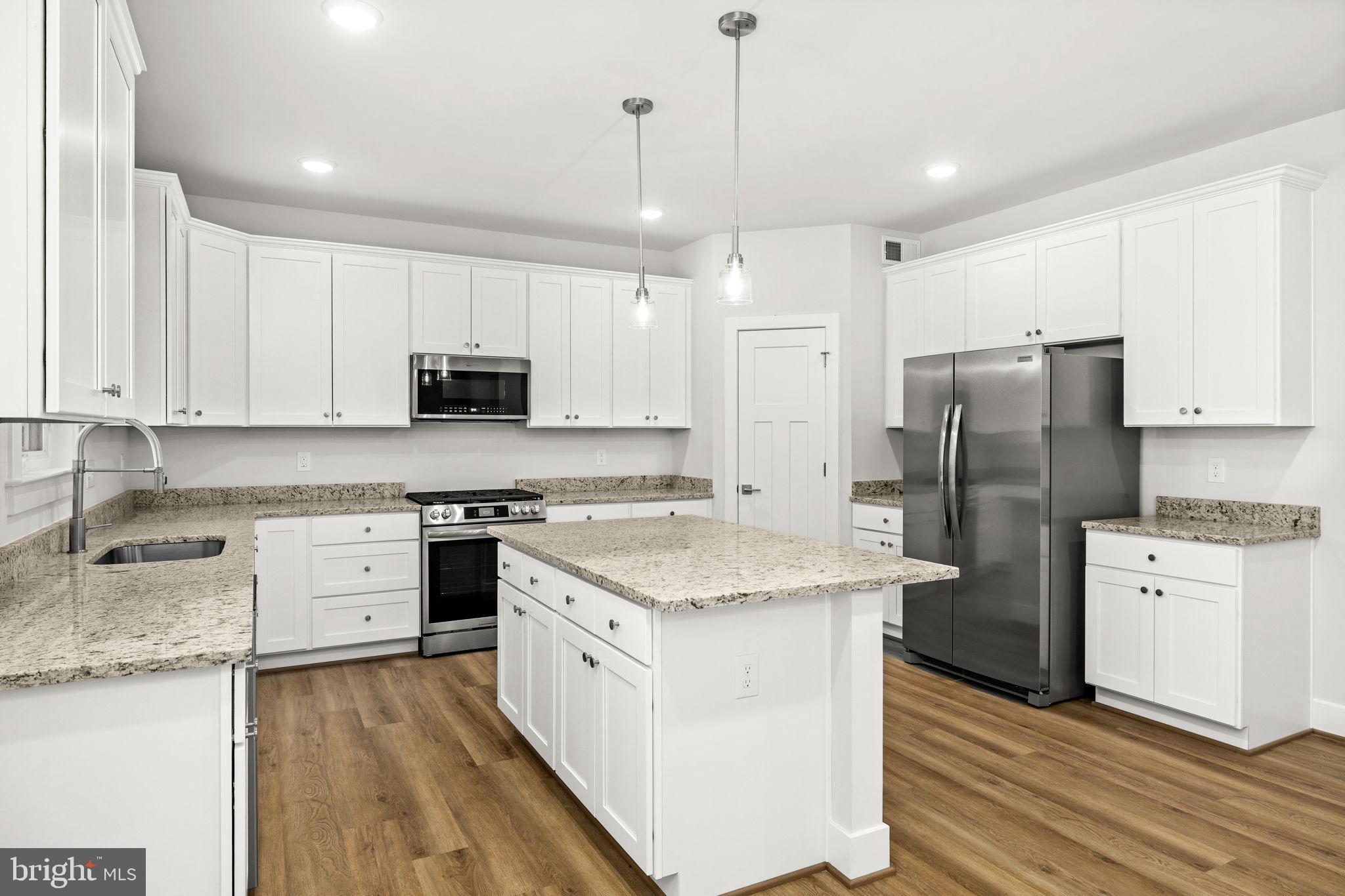 137 Indiantown Road King George, VA 22485 - Photo 12 of 31 Beautiful granite countertop elevate the kitchen
