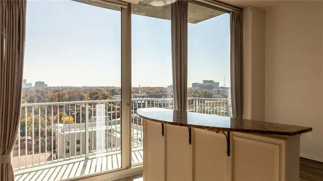 a view of a glass door with a view from a window