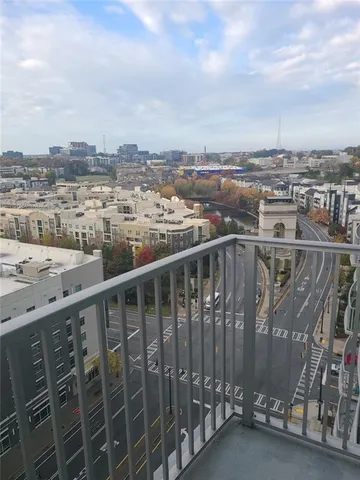 a view of a balcony with city view