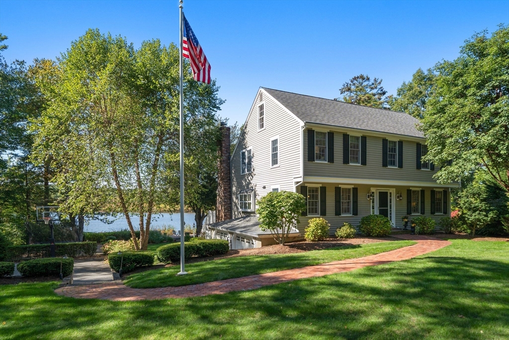 20 Island Creek Road Duxbury, MA 02332 - Photo 1 of 42 a front view of a house with a yard