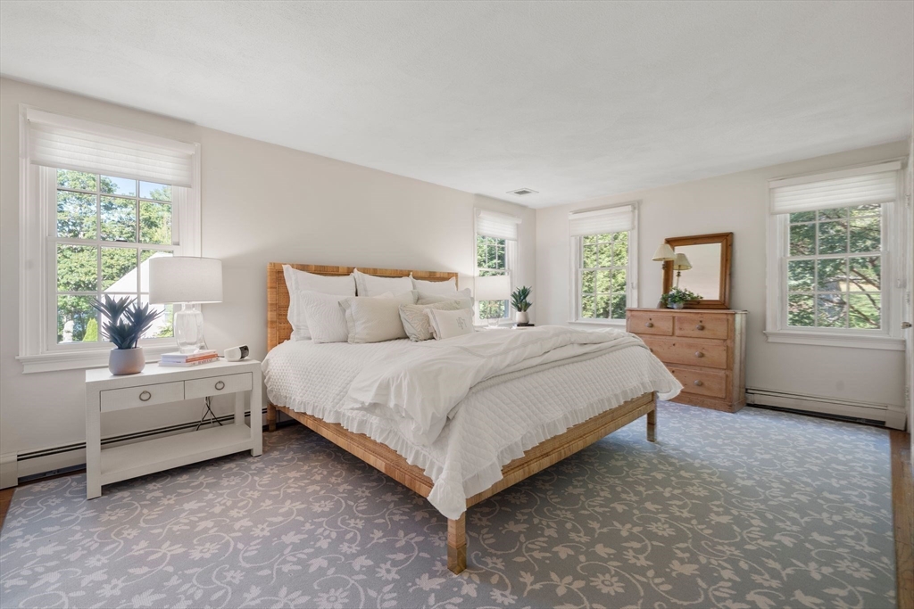 20 Island Creek Road Duxbury, MA 02332 - Photo 21 of 42 a bedroom with a bed and a window