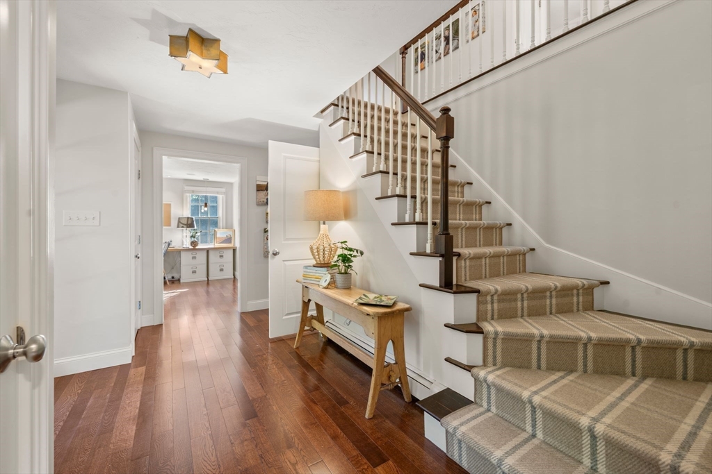 20 Island Creek Road Duxbury, MA 02332 - Photo 3 of 42 a view of entryway and hall with wooden floor