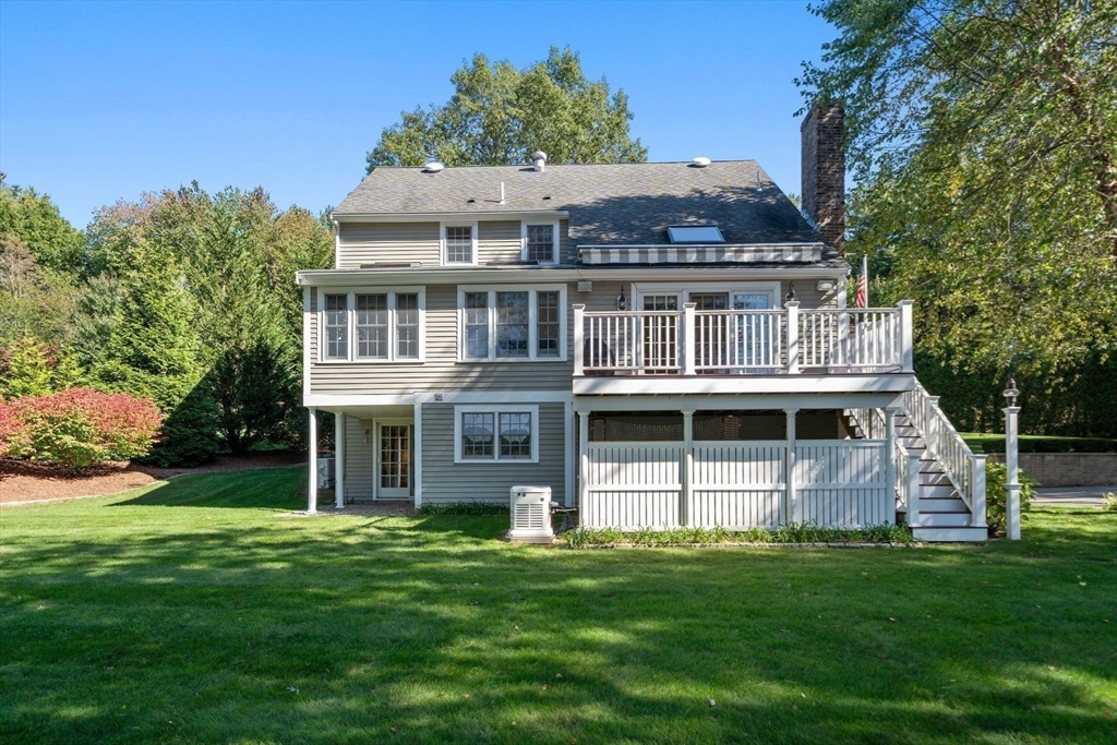 20 Island Creek Road Duxbury, MA 02332 - Photo 31 of 42 a front view of a house with a garden