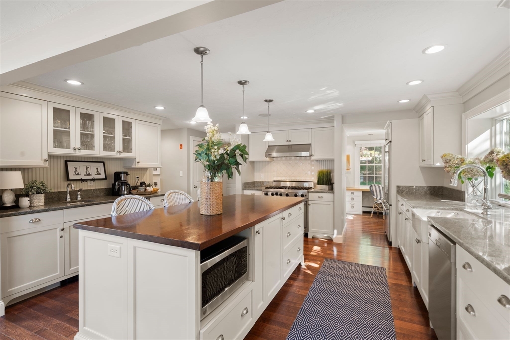 20 Island Creek Road Duxbury, MA 02332 - Photo 6 of 42 a kitchen with stainless steel appliances granite countertop a sink stove and refrigerator