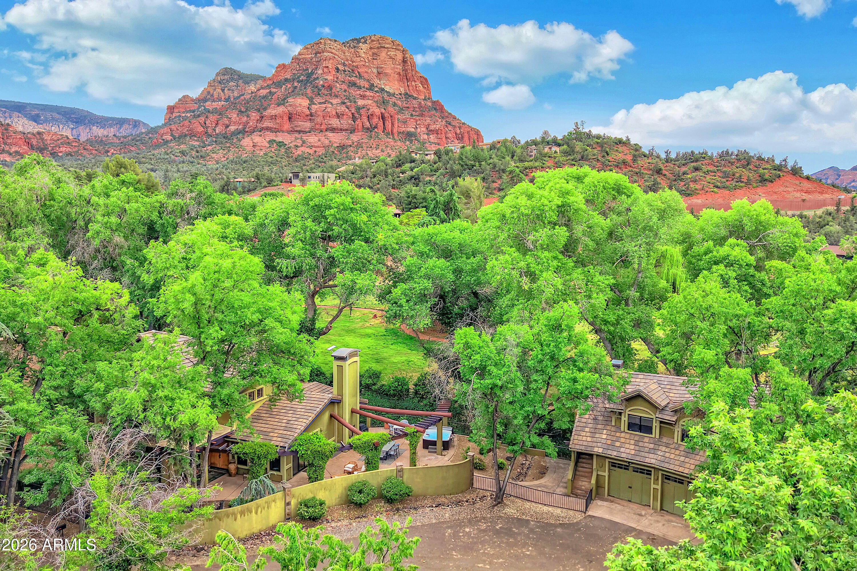 55 Ranch House Circle Sedona, AZ 86336 - Photo 61 of 61 a backyard of a house with lots of green space