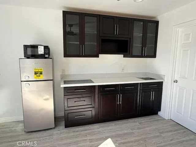 a bathroom with a sink and granite counter top